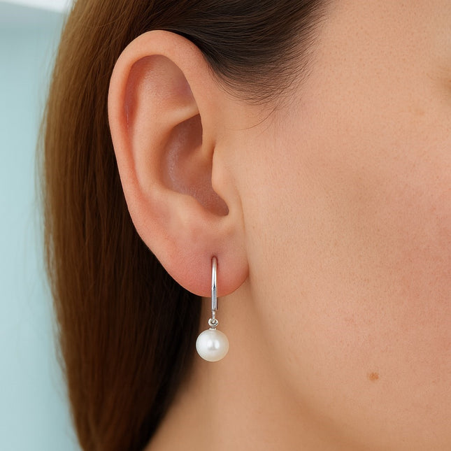 עגילי פנינה טבעית מזהב צהוב 14 קראט בעיצוב קלאסי יוקרתי ונקי