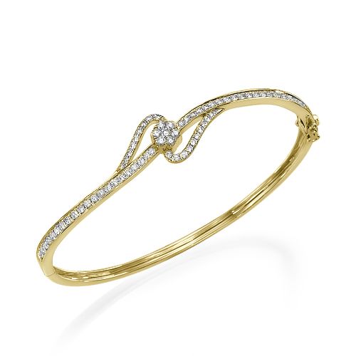 צמיד זהב צהוב עם יהלומים טבעיים בעיצוב מפותל ייחודי ובולט על היד