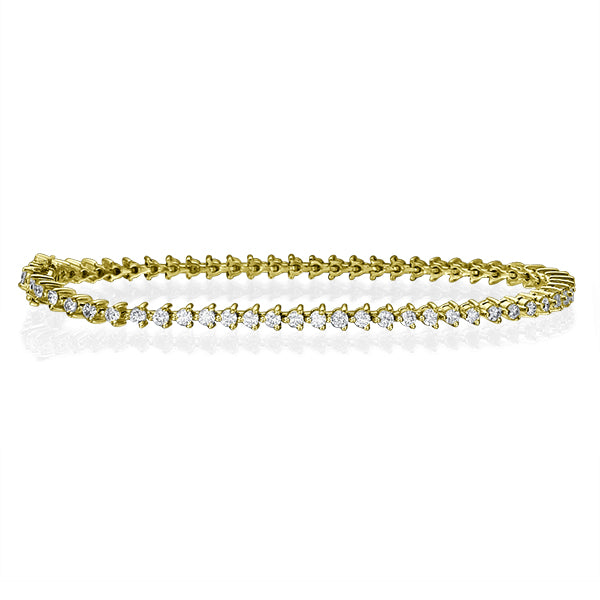 צמיד טניס מזהב לבן עם יהלומים טבעיים 2.50 קראט בשיבוץ שלוש שיניים