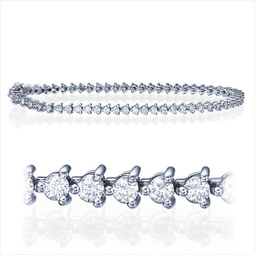 צמיד טניס מזהב לבן עם יהלומים טבעיים 2.50 קראט בשיבוץ שלוש שיניים