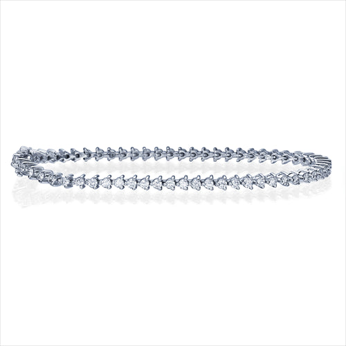 צמיד טניס מזהב לבן עם יהלומים טבעיים 2.50 קראט בשיבוץ שלוש שיניים