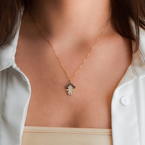 שרשרת יהלום וזהב עם תליון יהלומים בדמות ילדה