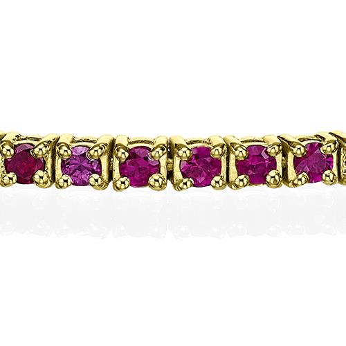 צמיד טניס מזהב לבן משובץ אבני רובי טבעיות לאורך כל החוליות בצבע חזק