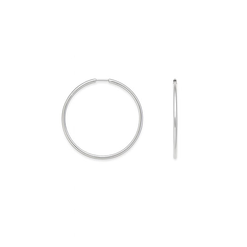 עגילי חישוק זהב בקוטר 2.4 ס"מ בעיצוב מינימליסטי ומדויק למראה יומיומי מושלם