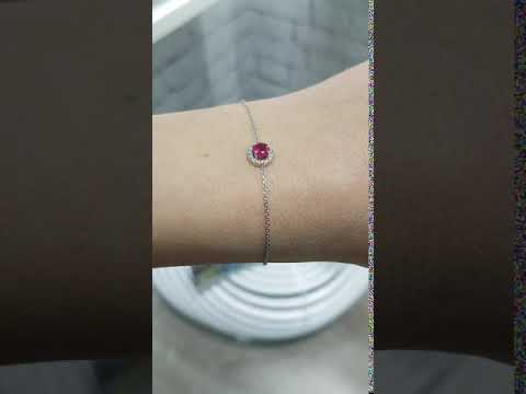 צמיד זהב עדין משובץ רובי טבעית במרכז ו-0.20 קראט של יהלומים מסביבה